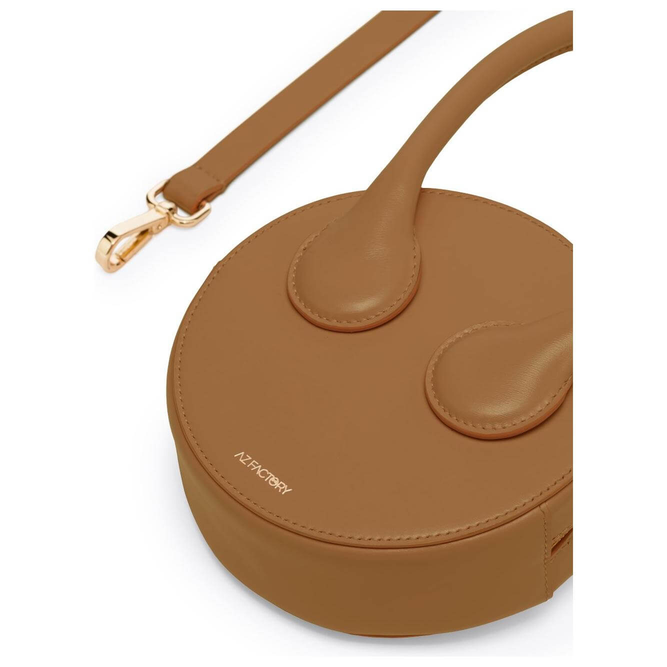 Camel brown leather round tote bag with logo stamp, circular handle, and detachable shoulder strap by Az Factory x Ester Manas.
