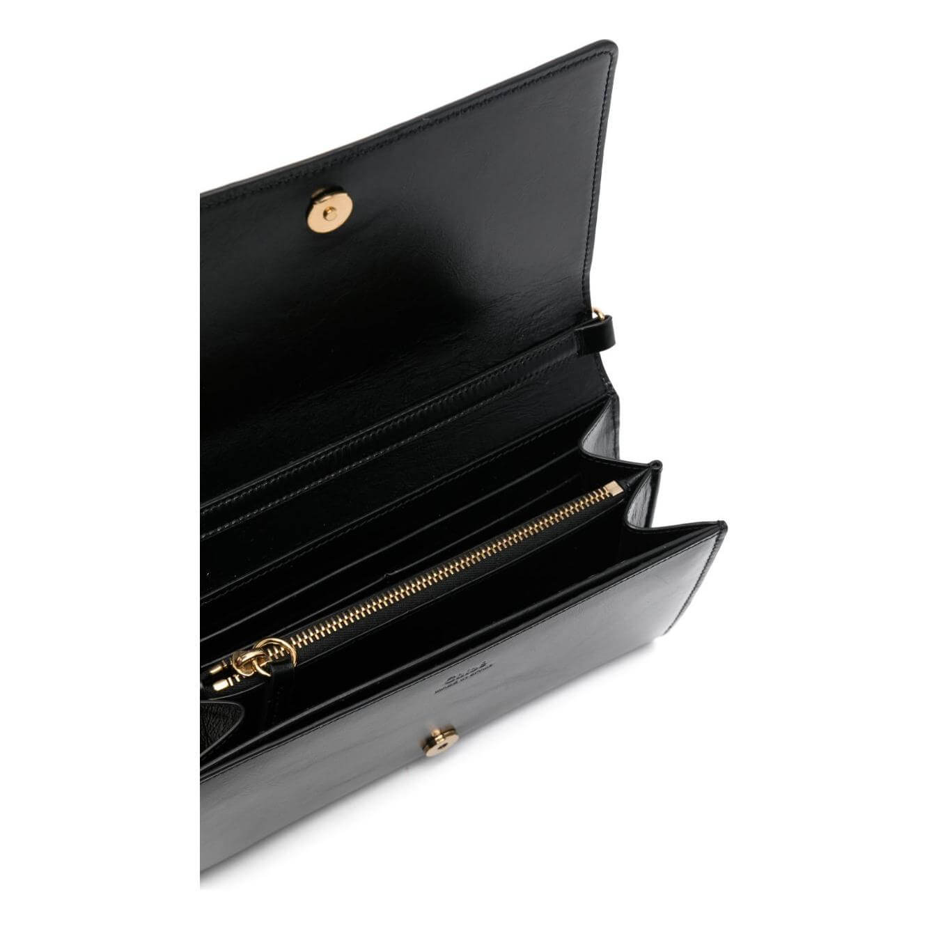 Open view of black Chloè Chloé Iconic flap crossbody bag with internal compartments and card slots.