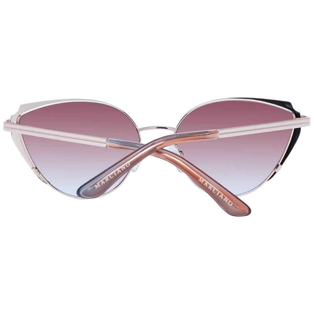 Rose gold cat eye sunglasses by Guess Marciano with gradient lenses and full-rim metal frame, perfect for UV protection.