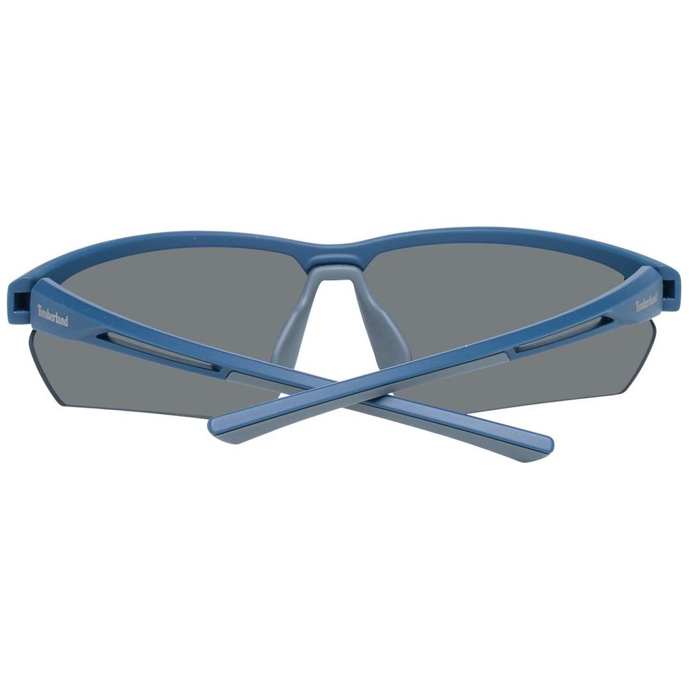 Timberland blue men's sunglasses with half-rim plastic frame, green lenses, UV protection, and branded case included for stylish wear.