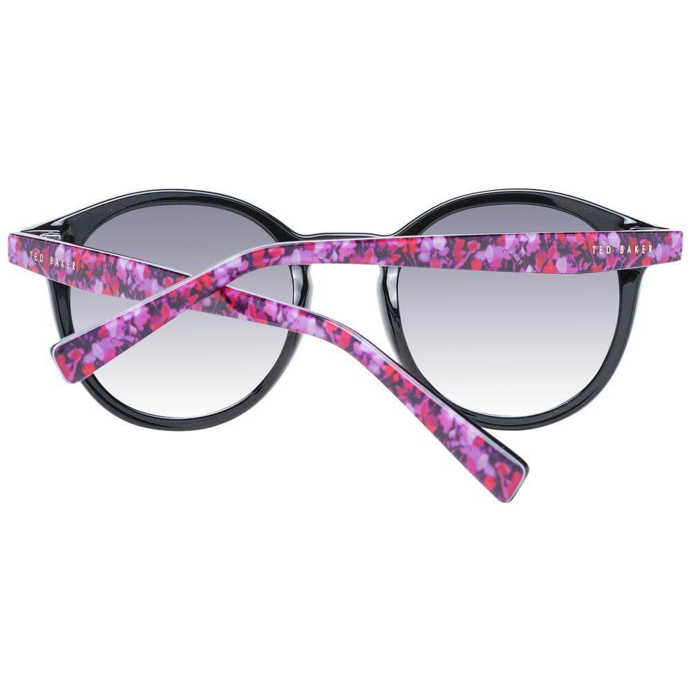 Ted Baker black women's sunglasses with round gradient blue lenses and floral pattern on arms, full-rim TR90 frame, UV protection.