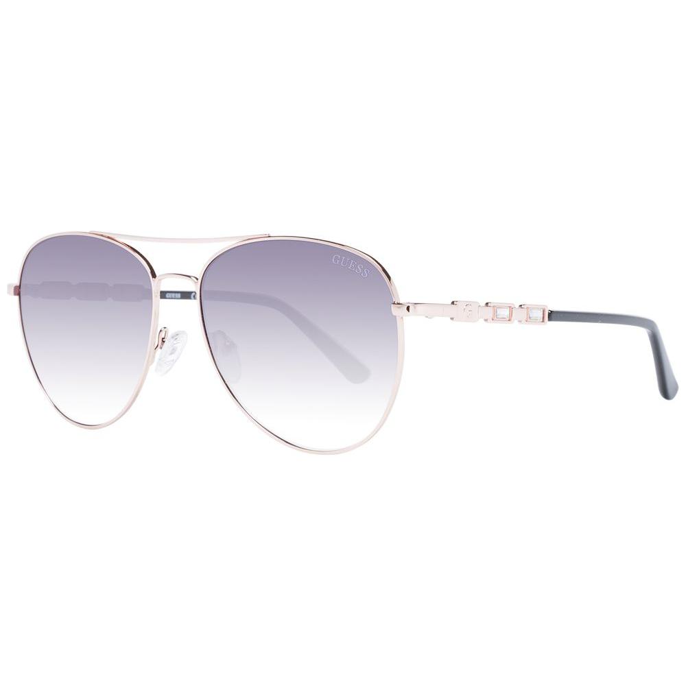 Guess women's aviator sunglasses in rose gold with grey gradient lenses, metal full-rim frame. Fashionable and protective eyewear.