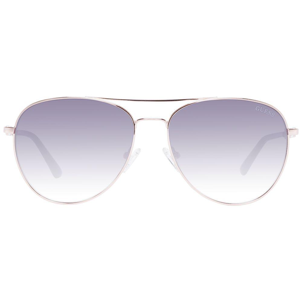 Guess rose gold women sunglasses with grey gradient lenses, aviator style, full-rim metal frame. 100% UVA & UVB protection.
