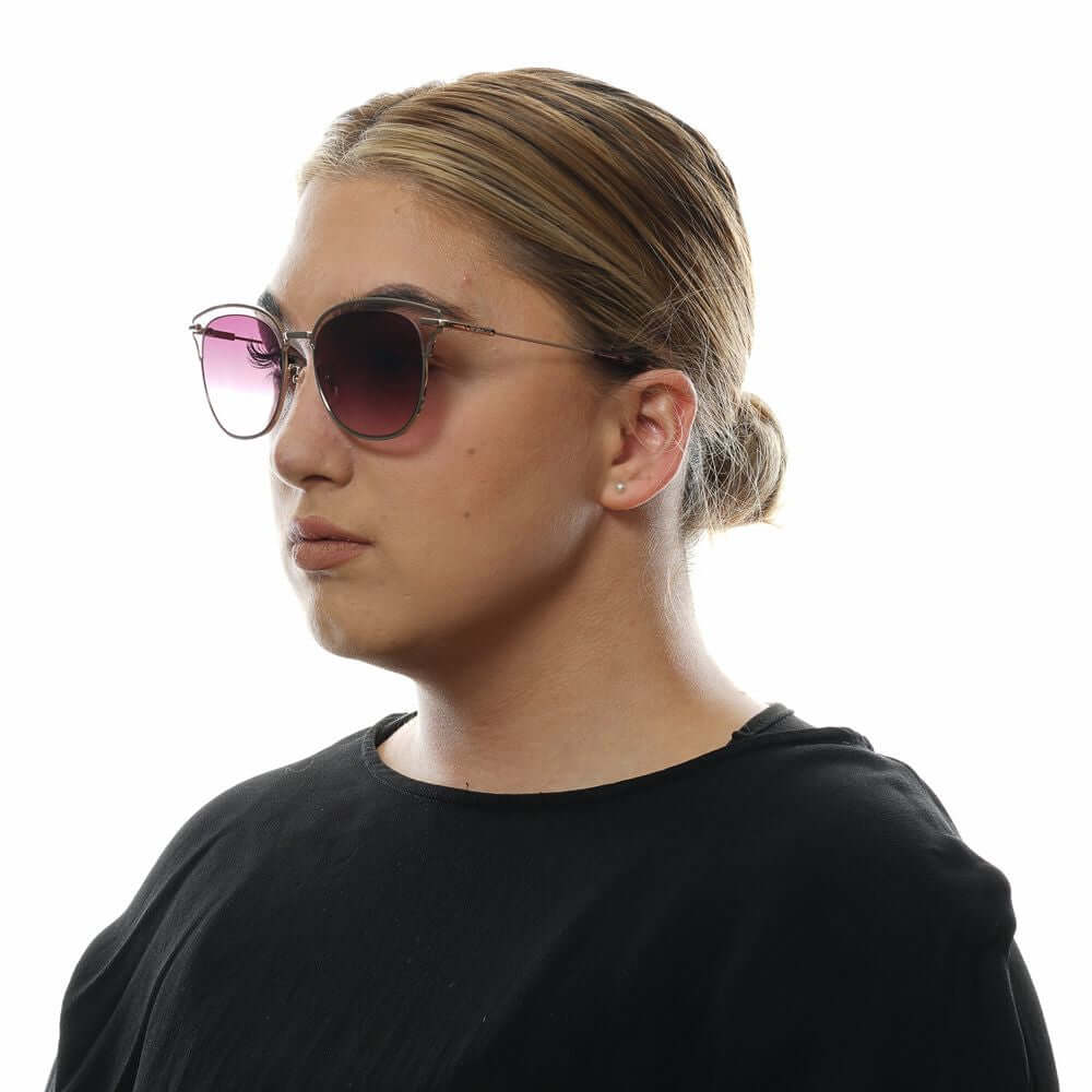 Woman wearing Police Burgundy Butterfly Sunglasses with gradient lenses, UV protection, metal and plastic frame.
