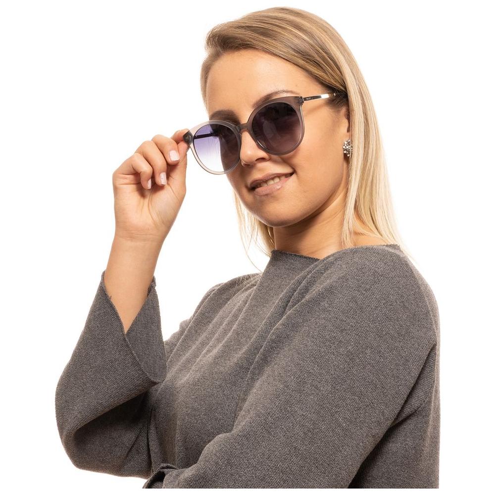 Woman wearing Bally Gray Round Sunglasses with Gradient Lenses