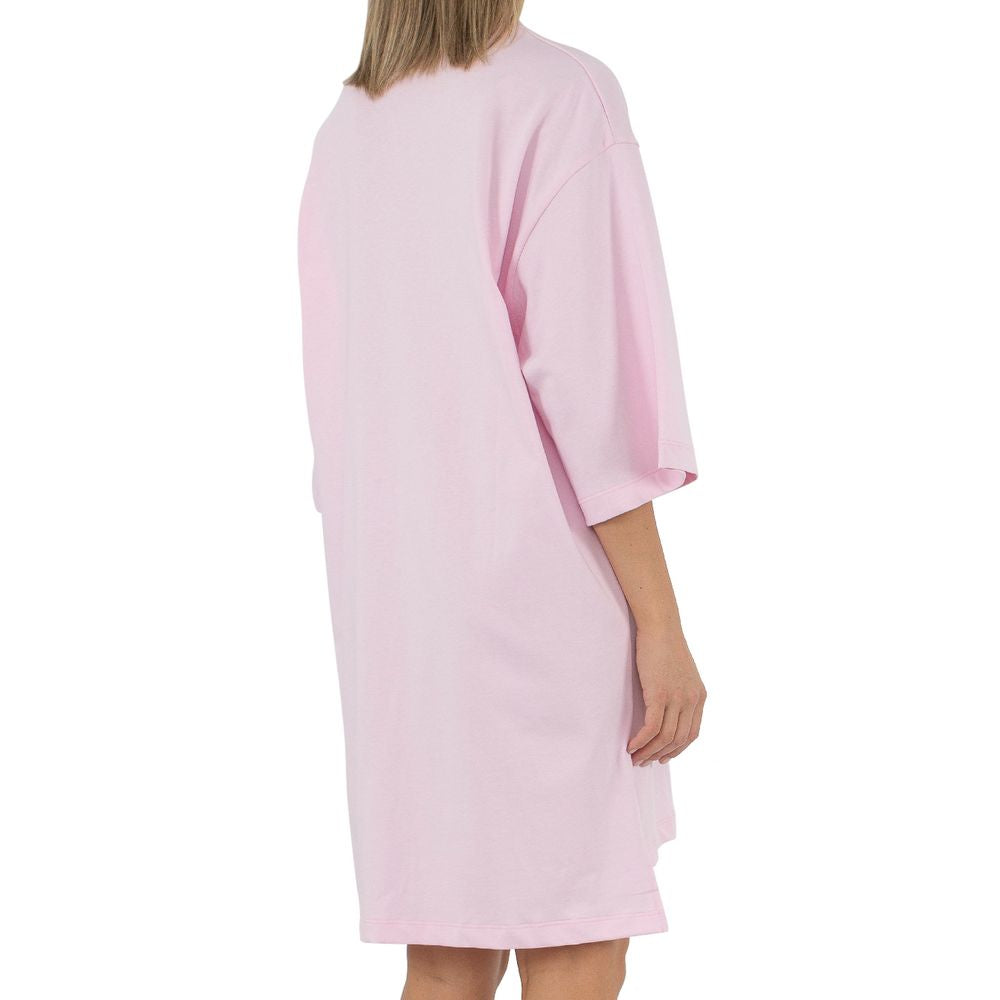 Comme Des Fuckdown pink cotton oversized t-shirt dress with logo print, back view showing relaxed fit.
