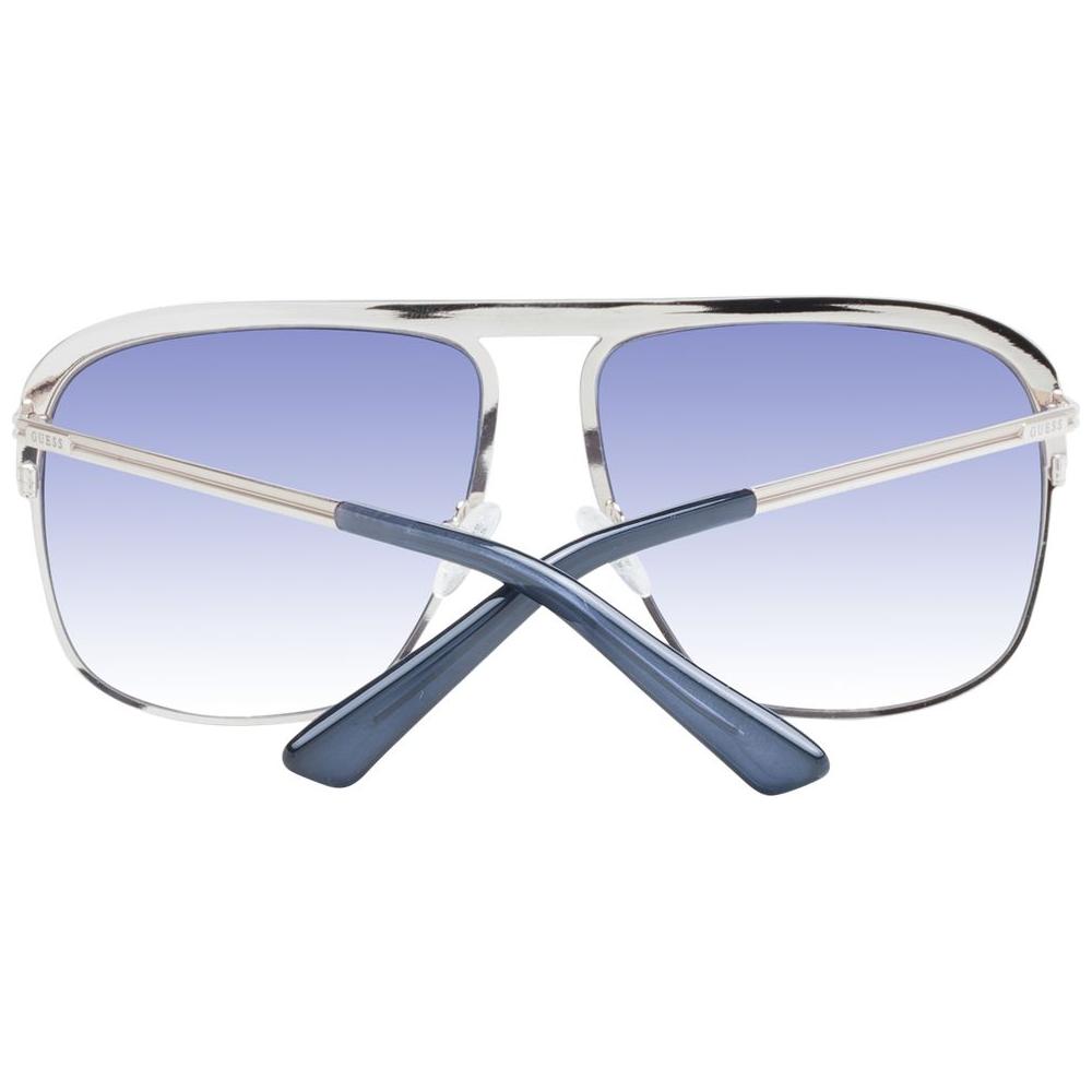 Guess Gold Unisex Sunglasses with gradient blue lenses, metal full-rim frame, and aviator style. Includes branded case, 100% UV protection.
