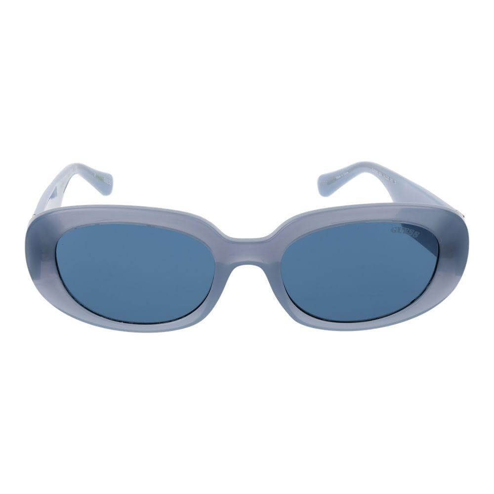 Guess blue women's full-rim oval sunglasses in plastic with blue lenses, offering 100% UVA & UVB protection. Size 54-20-140.