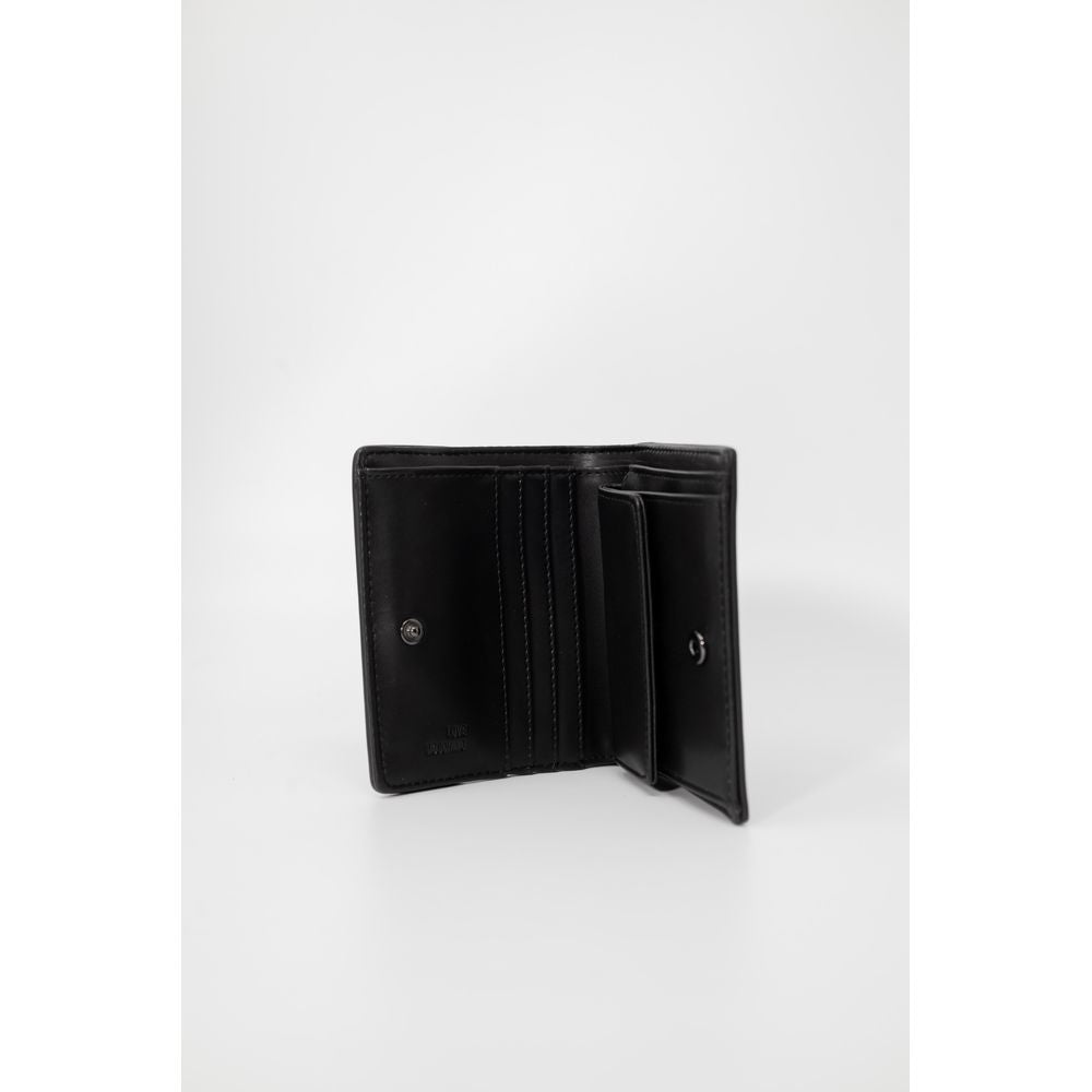 Open Love Moschino black small faux leather wallet, spring/summer collection with multiple card slots and coin pocket.