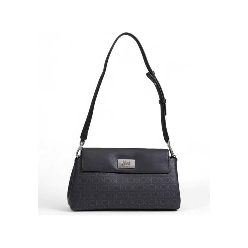 Calvin Klein black recycled polyester handbag, fall/winter collection; women's bag with adjustable strap, elegant and eco-friendly fashion.