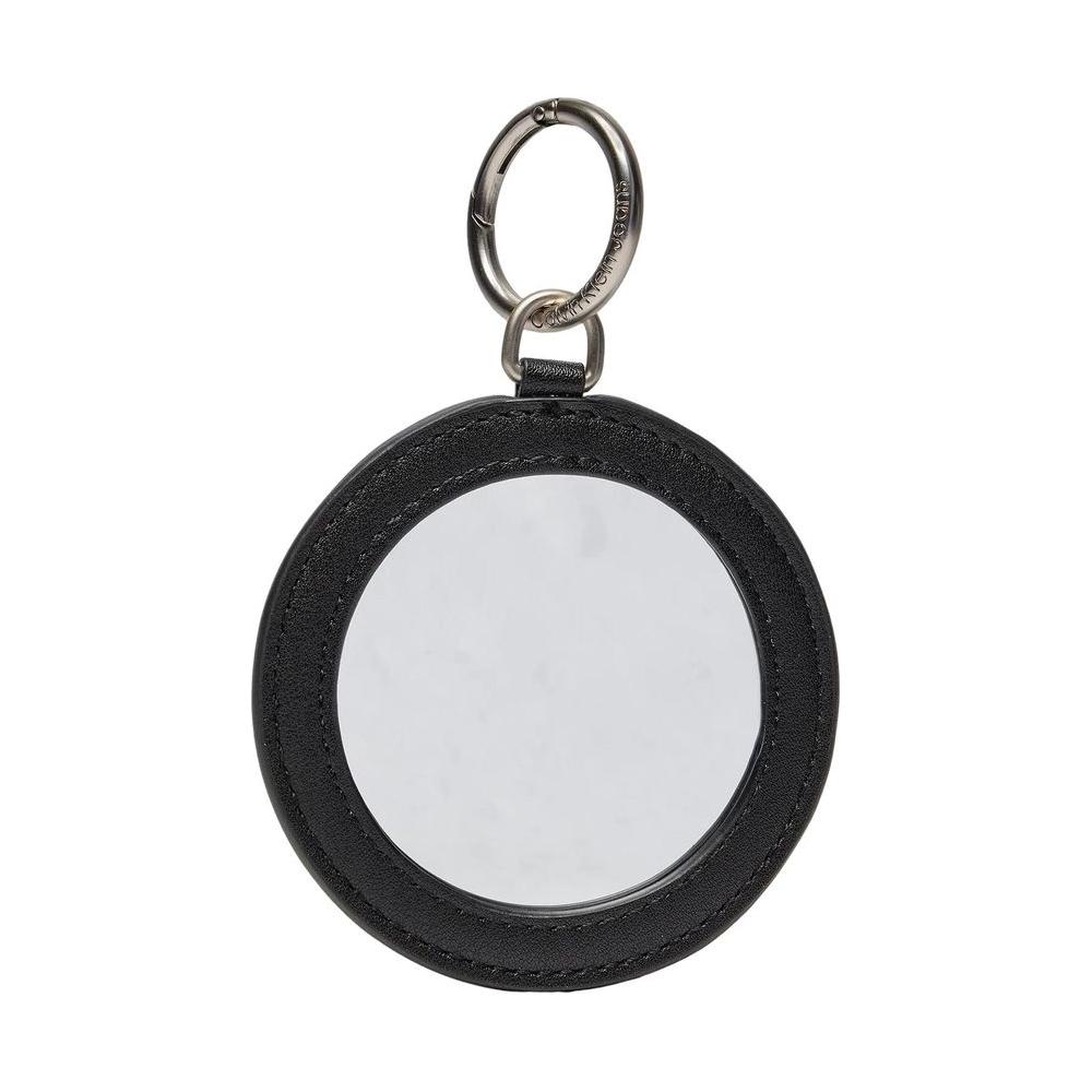 Round black leather keychain with metal ring and mirror center.