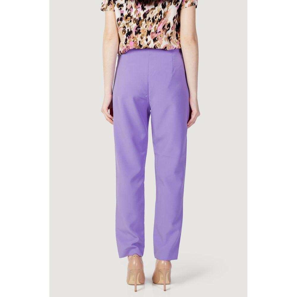 Back view of women's purple polyester cigarette pants, spring/summer collection, featuring 40% recycled polyester and 8% elastane.