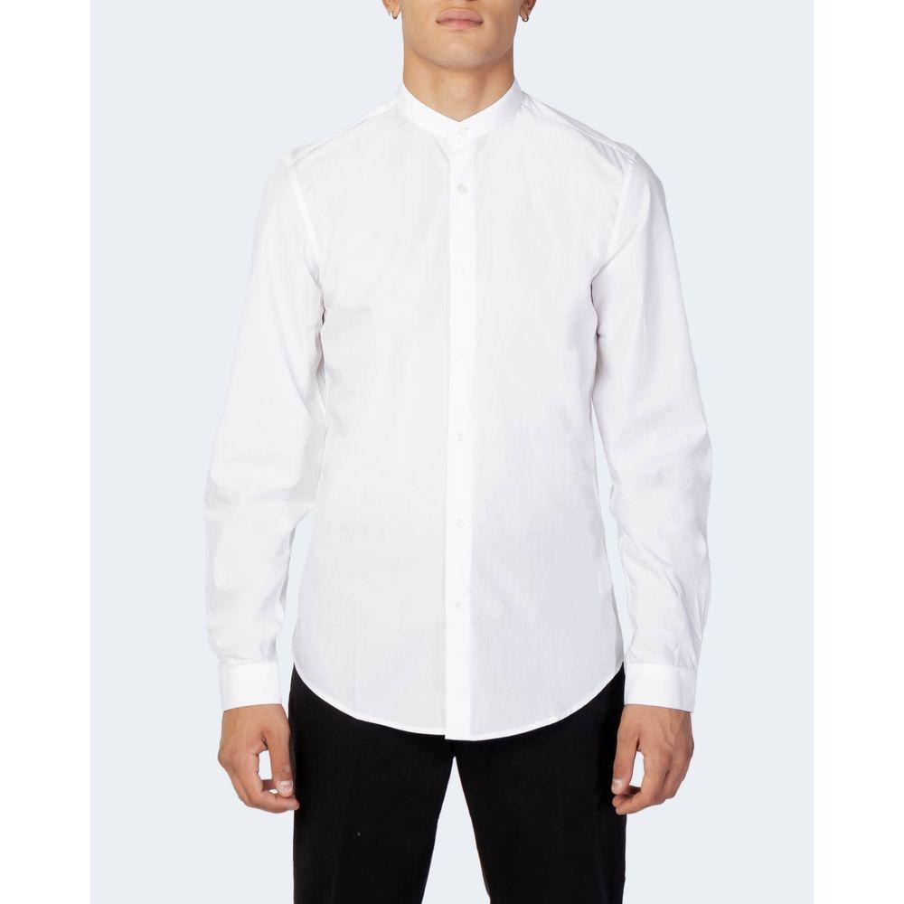 Man wearing Antony Morato white cotton shirt, slim fit long-sleeve design with button closure, ideal for formal or casual occasions.