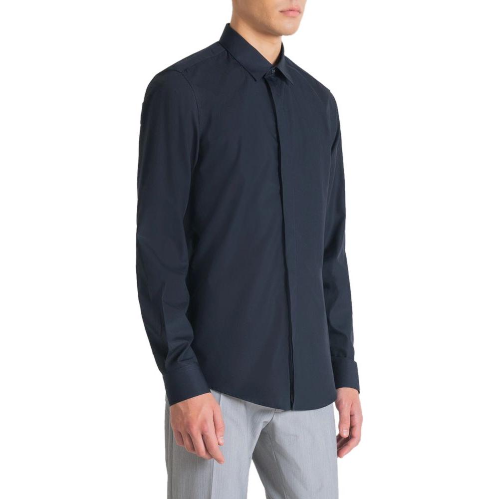 Antony Morato blue cotton shirt, slim fit long-sleeve design, worn by model, perfect for formal or casual-chic style, versatile wardrobe essential.