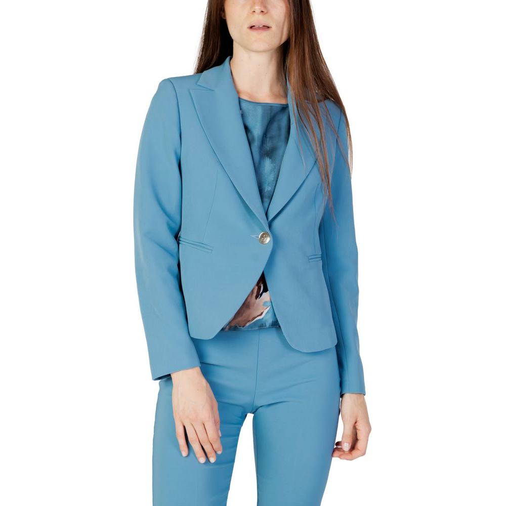 Woman wearing Rinascimento turquoise polyester suit and blazer, autumn/winter collection, women's fashion jacket, 100% polyester.