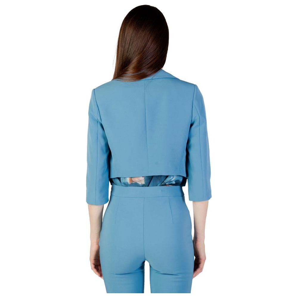 Back view of Rinascimento turquoise women's jacket and blazer, autumn/winter collection, made of 100% polyester.