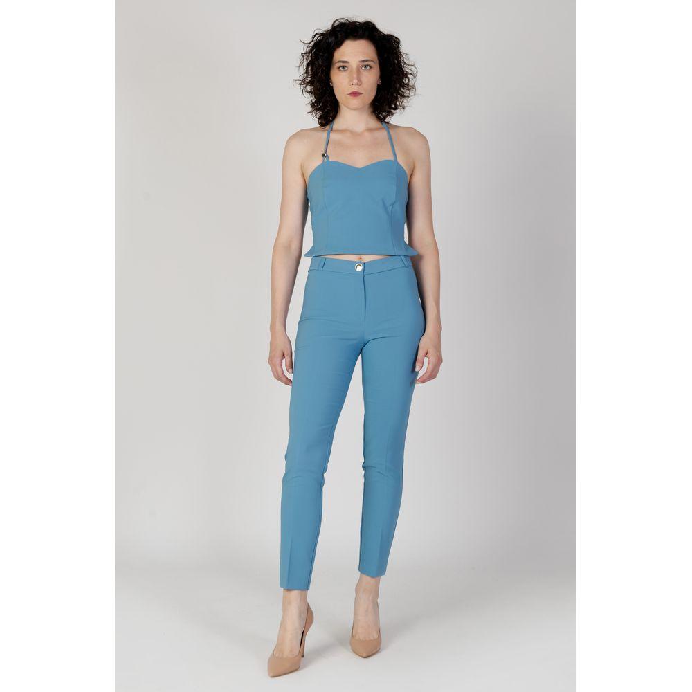 Model wearing Rinascimento turquoise polyester top and t-shirt, autumn/winter collection, women's fashion.