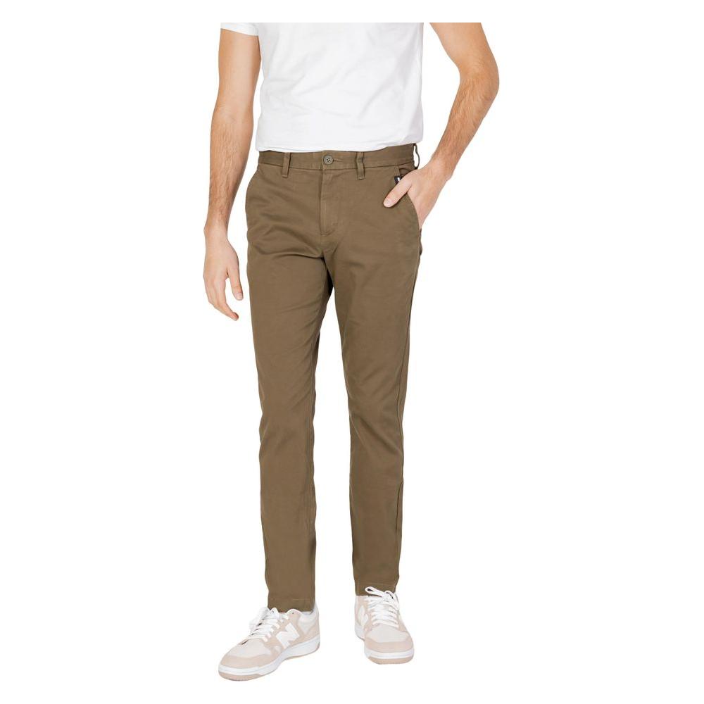Men's tapered Tommy Hilfiger green organic cotton jeans for spring/summer.