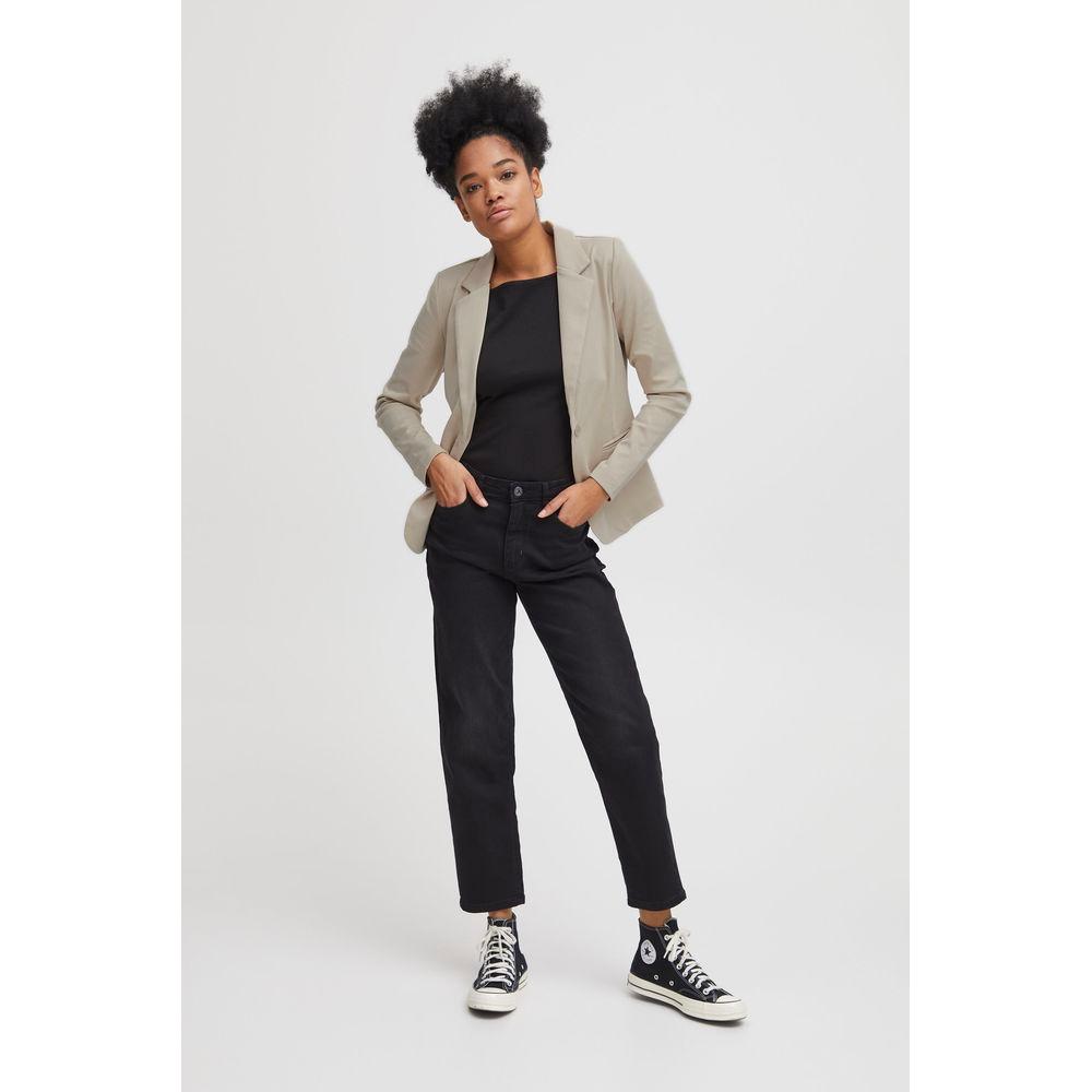 Woman wearing ICHI beige blazer from Fall/Winter collection, polyester blend, styled with black jeans and matching top.