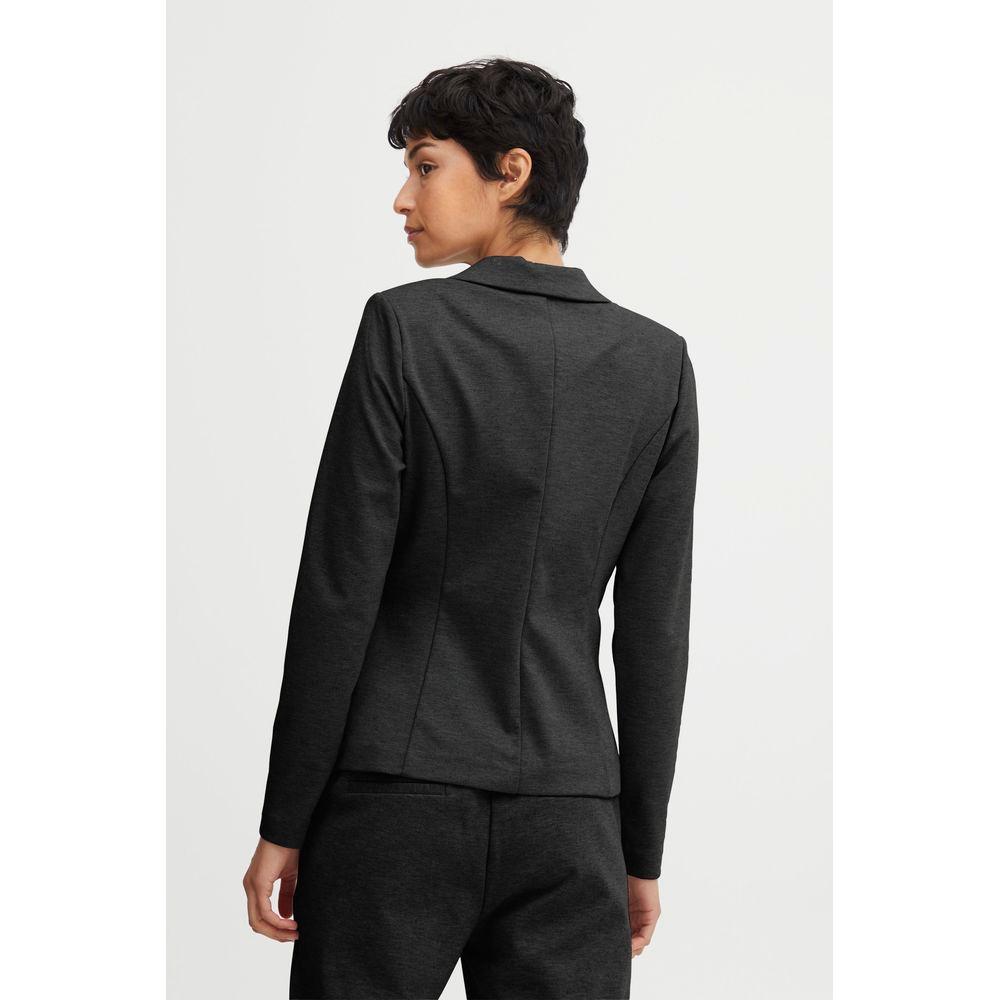 Woman wearing ICHI gray polyester suit blazer from the Fall/Winter collection, showcasing the back design.