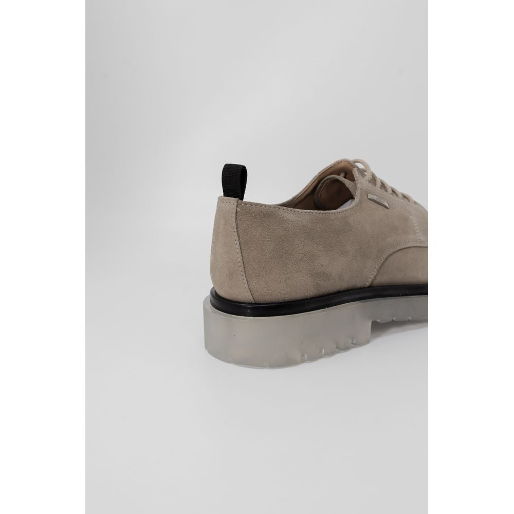 Beige Antony Morato dress shoe featuring leather, polyurethane, polyester, and synthetic rubber materials, side view with clear sole.