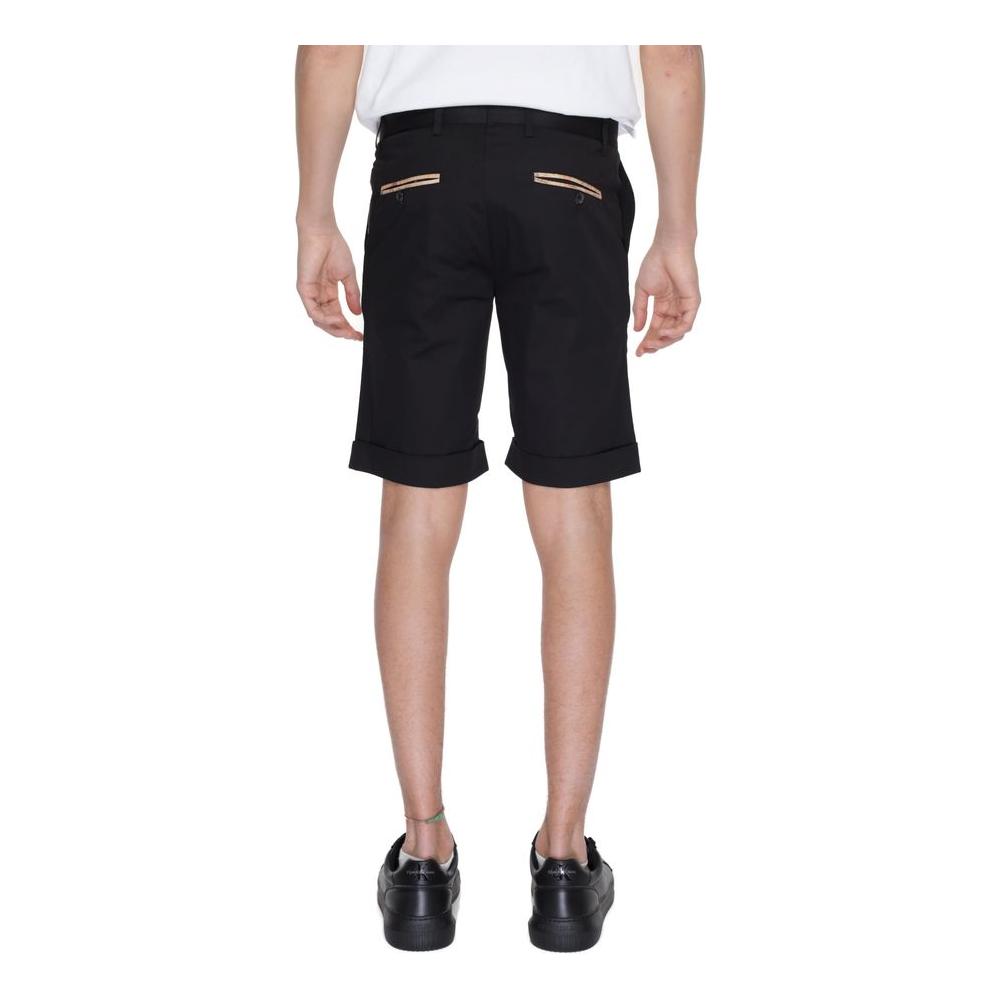 Back view of Alviero Martini Prima Classe black cotton bermuda shorts from the men's Spring/Summer collection, showcasing zip details.