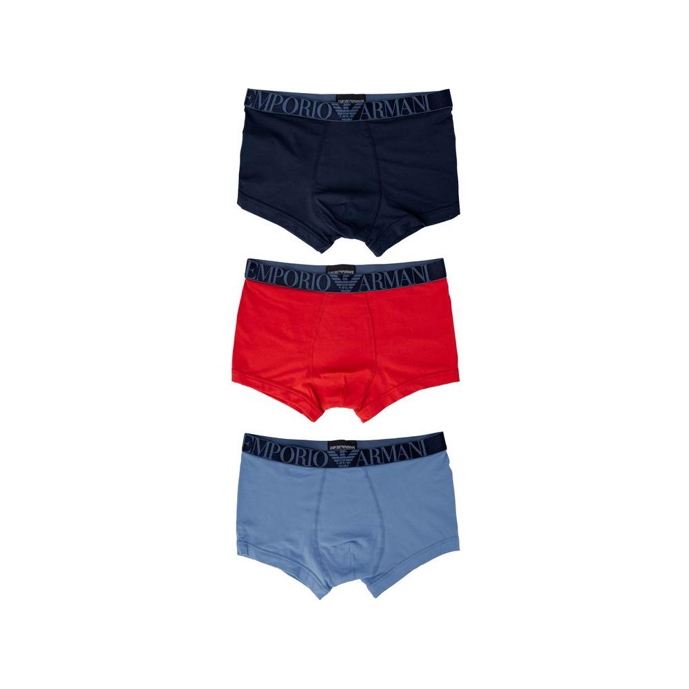 Three pairs of Emporio Armani men's boxers in black, red, and blue, featuring a branded elastic waistband for comfort and style.