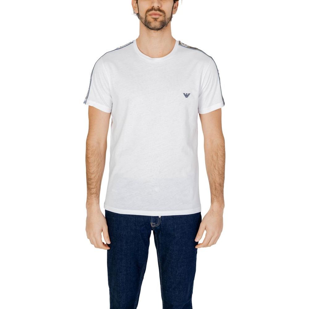 Man wearing Emporio Armani white cotton t-shirt, short-sleeve design, showcasing brand logo, ideal for versatile casual settings.
