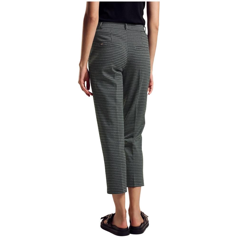 Back view of Street One green checkered polyester women's pants, part of the Fall/Winter collection, shown worn by a model.