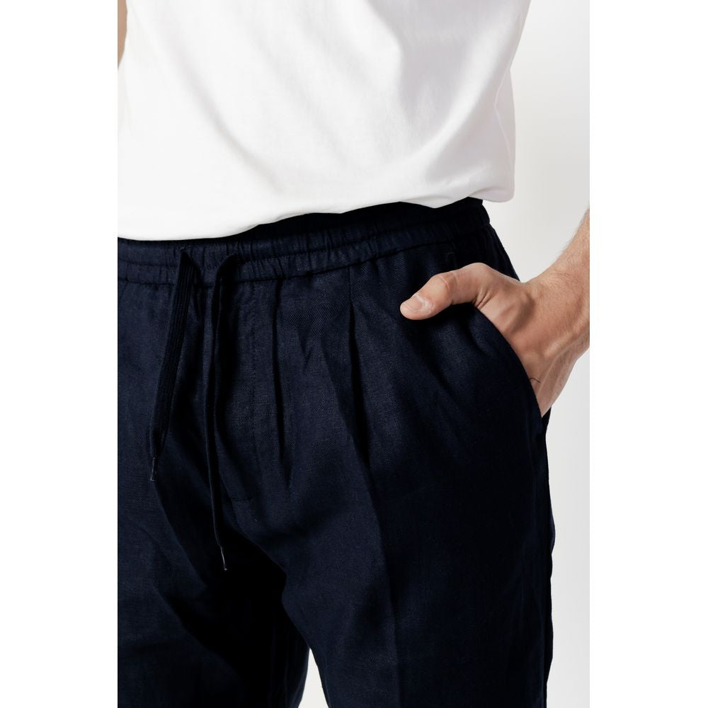 Close-up of Antony Morato blue linen trousers with a regular fit, showcasing lightweight fabric and comfortable design.