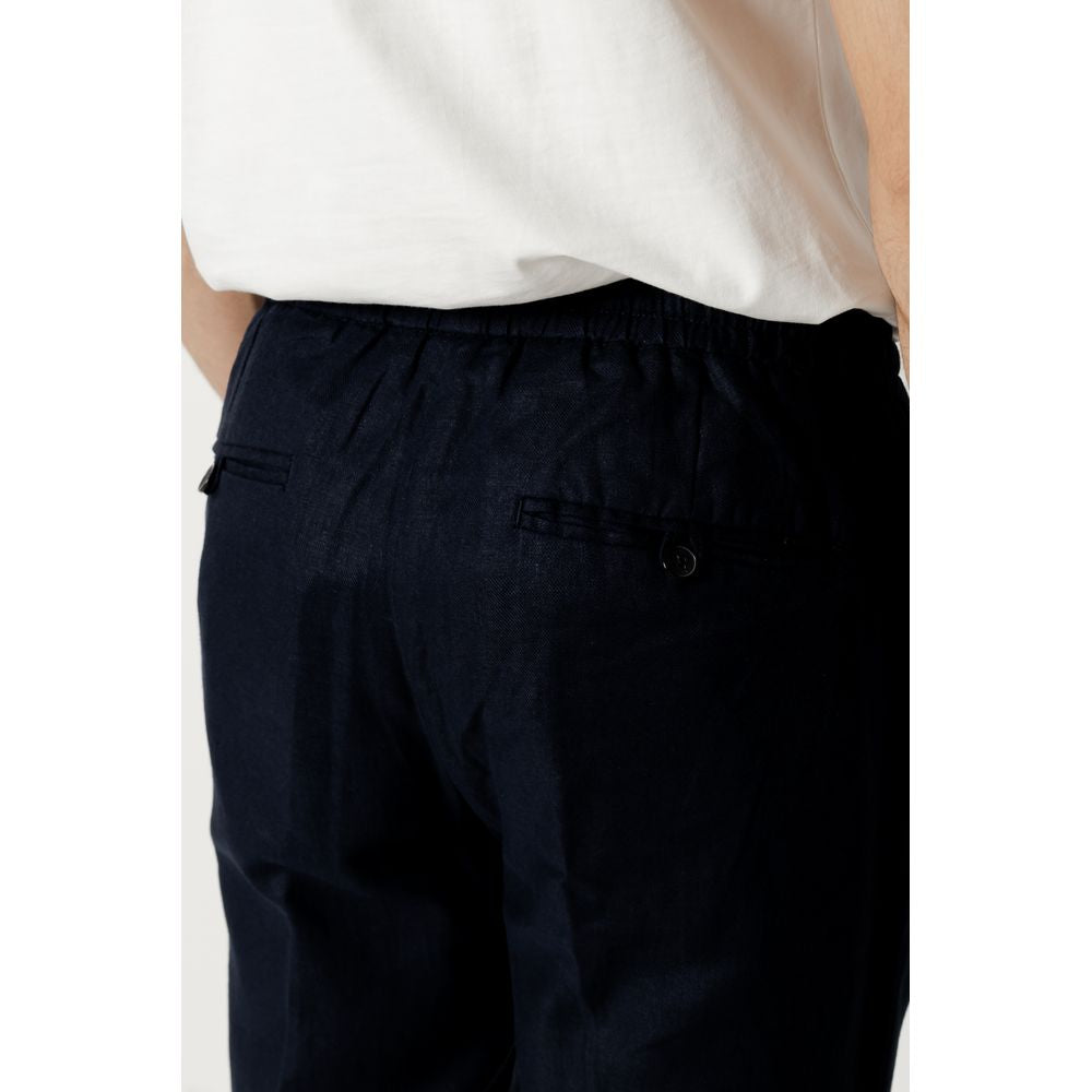 Back view of Antony Morato blue linen trousers in regular fit, showcasing comfort and elegance for casual or refined occasions.