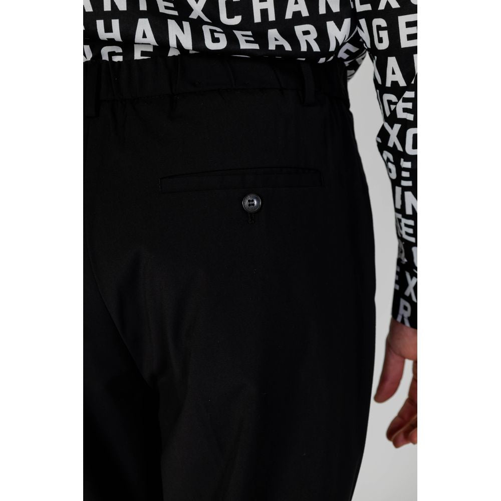 Back view of Antony Morato black polyester jeans and pants with button detail, part of the men's spring/summer collection.