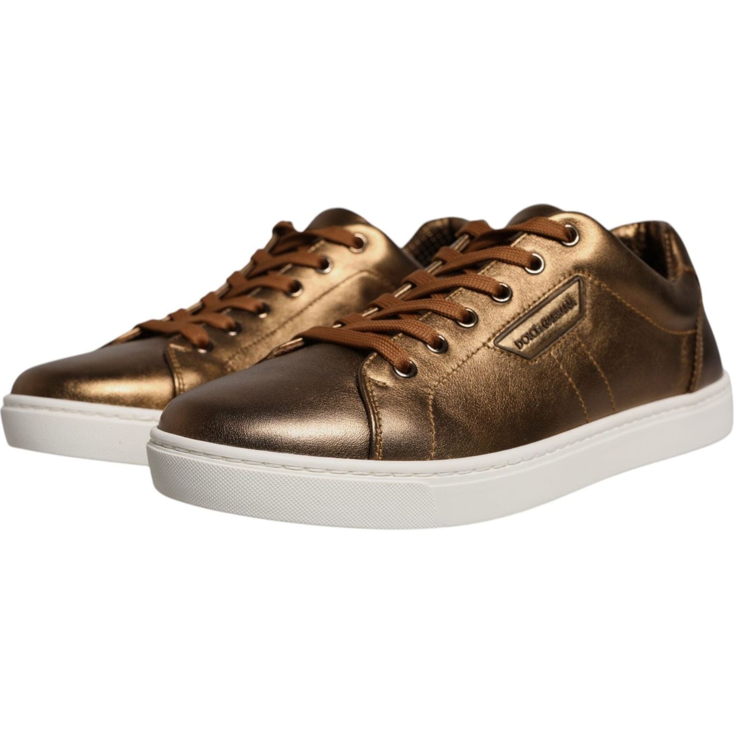 Dolce & Gabbana gold leather London men's sneakers with white rubber sole and logo, stylish and high-quality Italian craftsmanship.