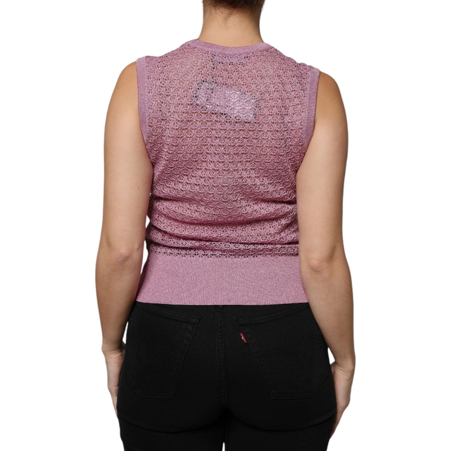 Dolce & Gabbana pink mesh see-through sleeveless tank top, back view, featuring intricate pattern, made in Italy.