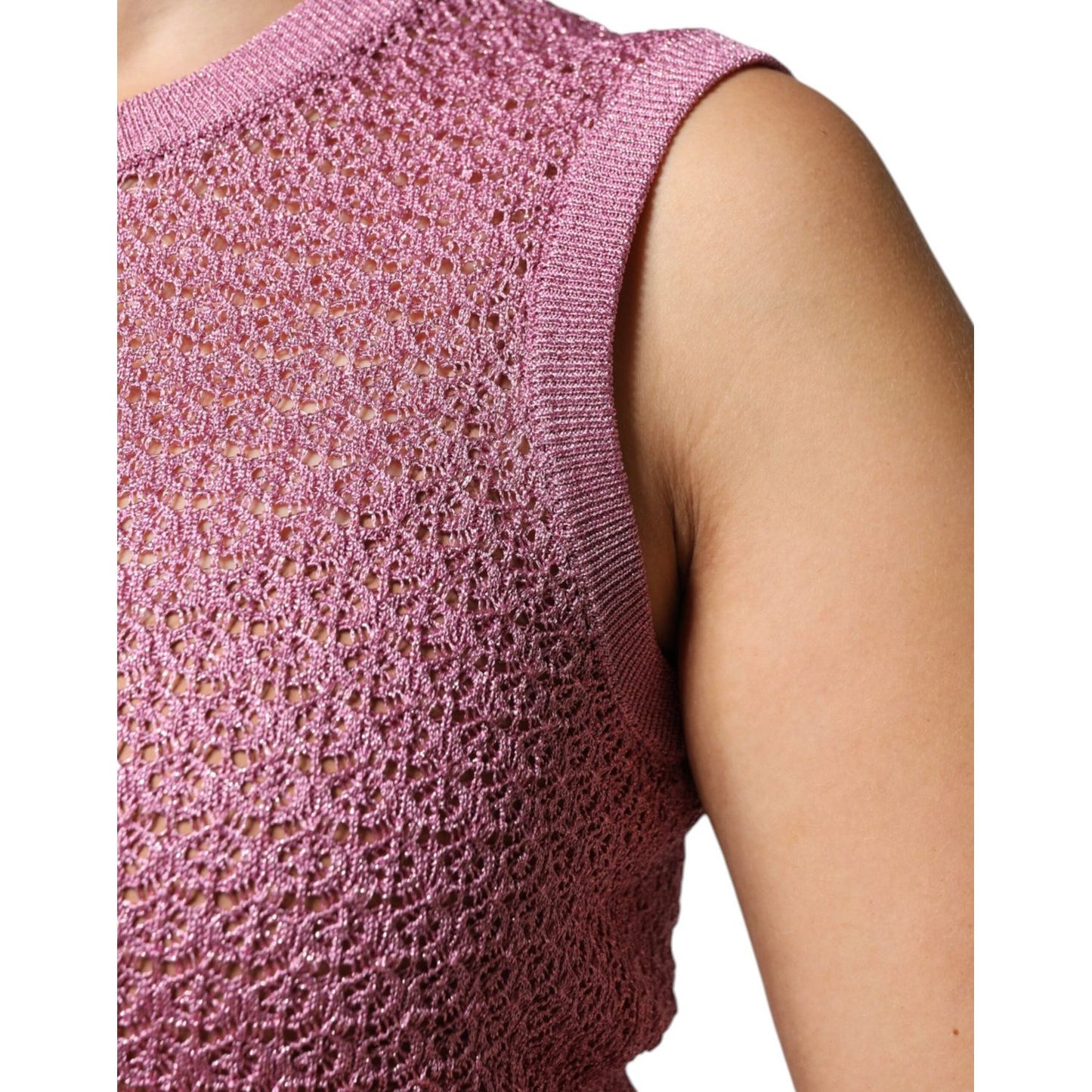 Dolce & Gabbana pink mesh see-through sleeveless tank top, close-up of texture and detail, featuring logo, made in Italy.