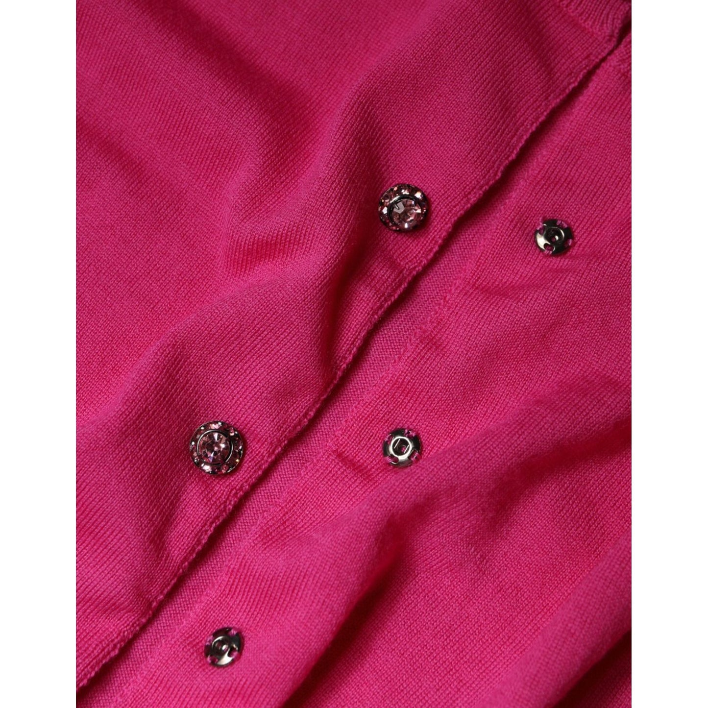 Dolce & Gabbana pink wool button down cardigan sweater with logo details, 100% virgin wool, close-up of buttons, made in Italy