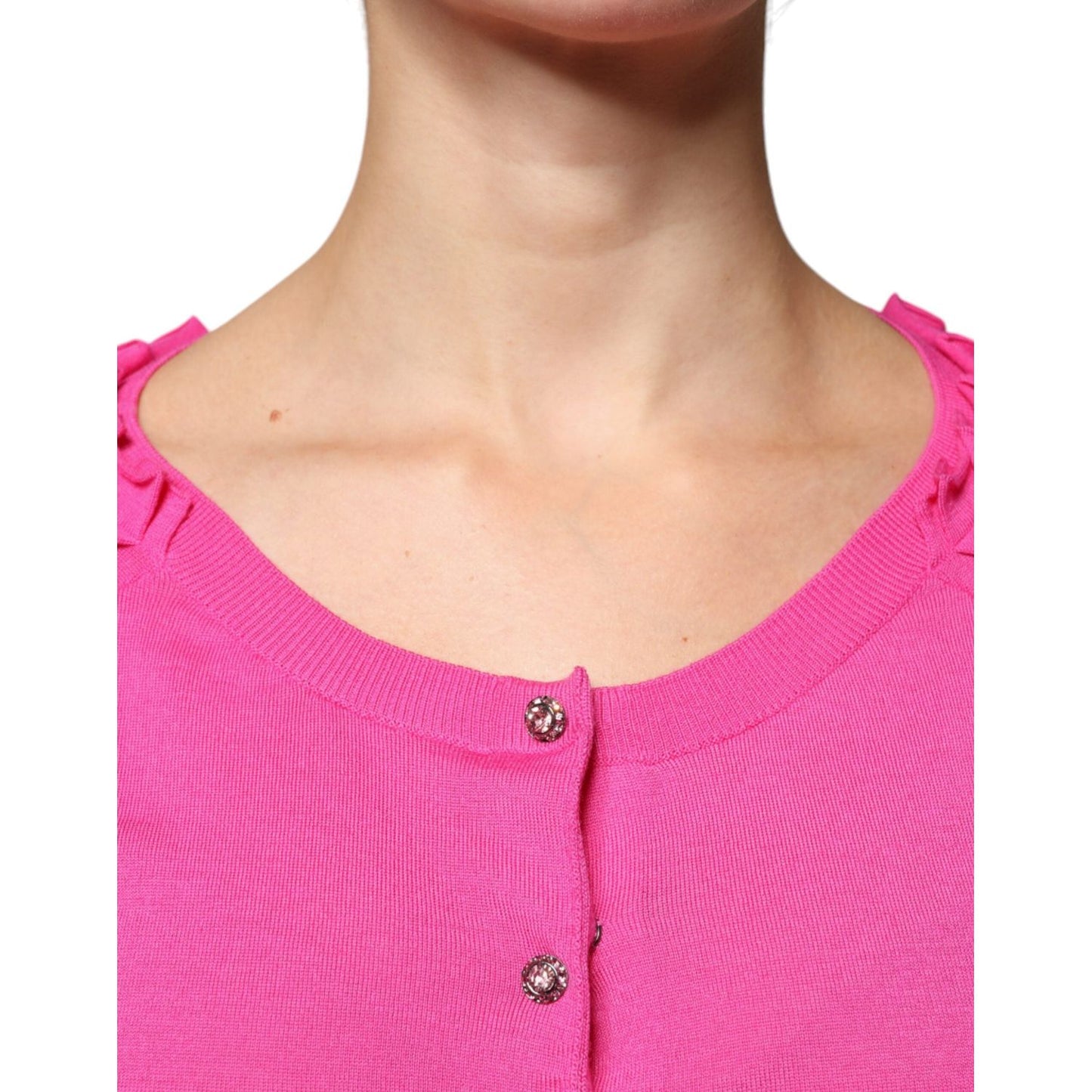 Dolce & Gabbana pink wool cardigan sweater with button-down closure and round neck, featuring exclusive Italian craftsmanship.