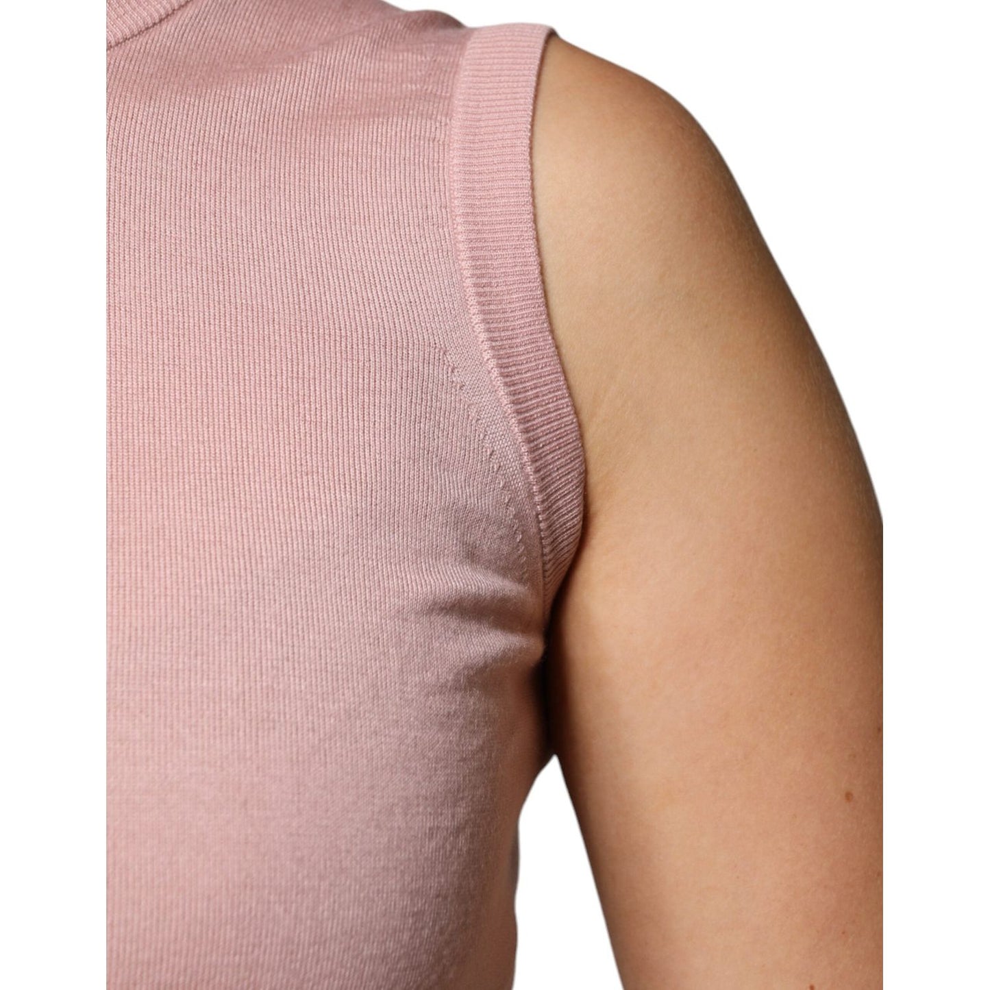 Dolce & Gabbana pink cashmere sleeveless tank top showcasing fine knit detail and luxurious texture with silk blend.