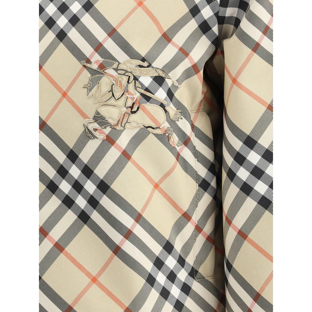 Burberry reversible jacket featuring iconic Check Archivio pattern with embroidered logo detail.