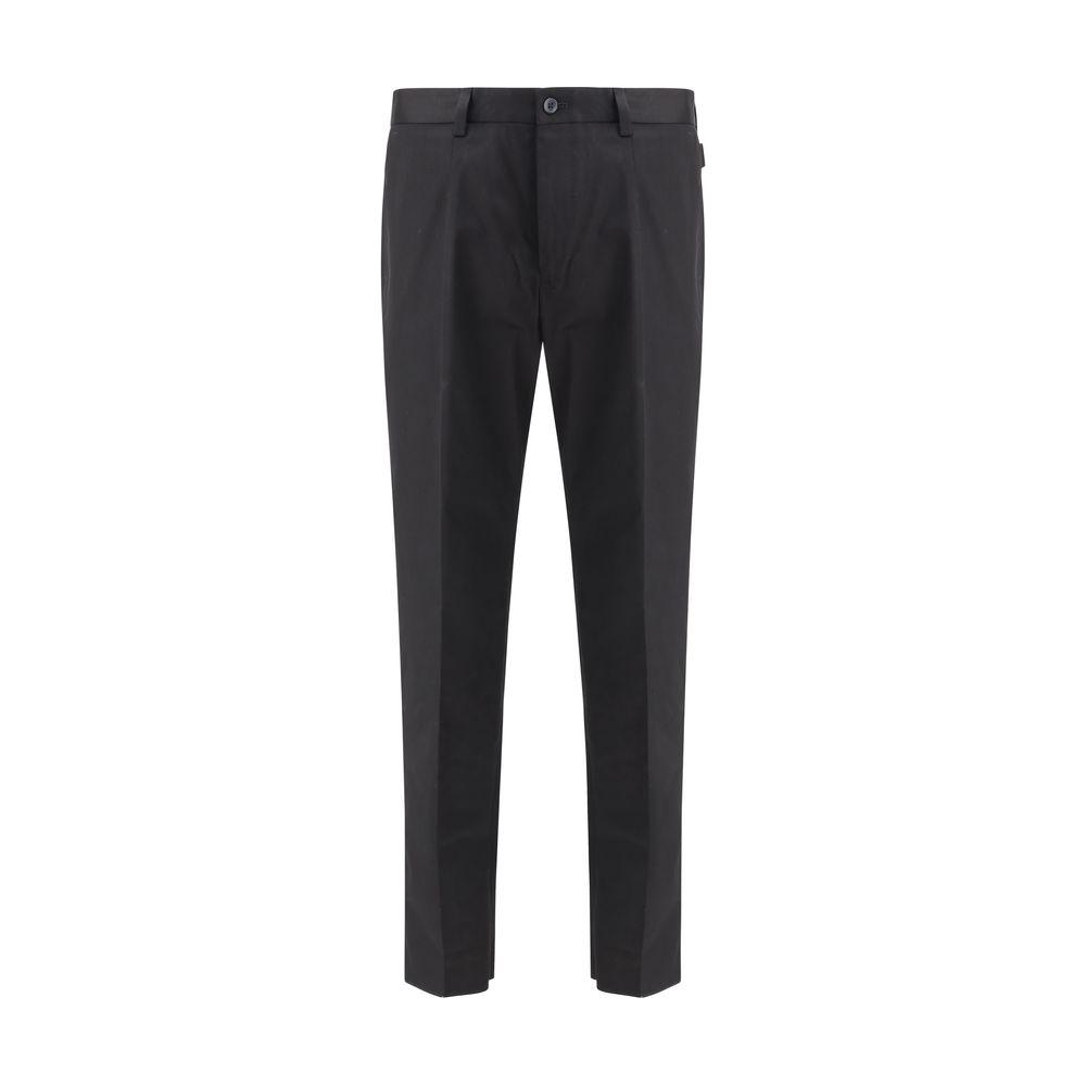 Dolce & Gabbana mid-rise cotton pants with front button, zipper closure, side slash pockets, back welt pockets, regular fit