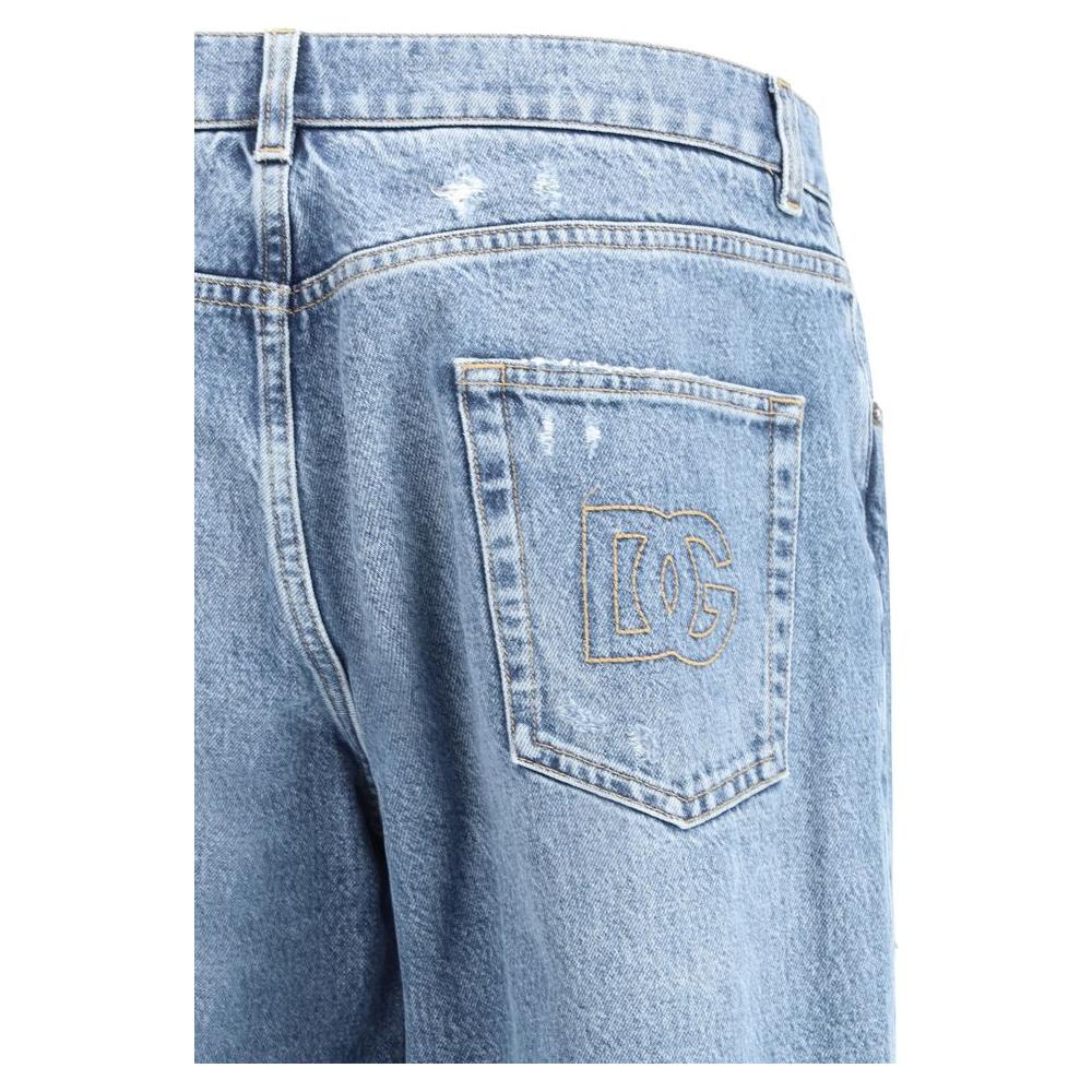 Dolce & Gabbana jeans back pocket with embroidered logo, vintage worn-effect, and mid-rise waist, showcasing style and sophistication.