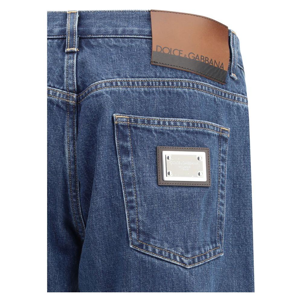 Dolce & Gabbana jeans with logo plaque on back pocket, showcasing straight five-pocket style and mid-rise fit.