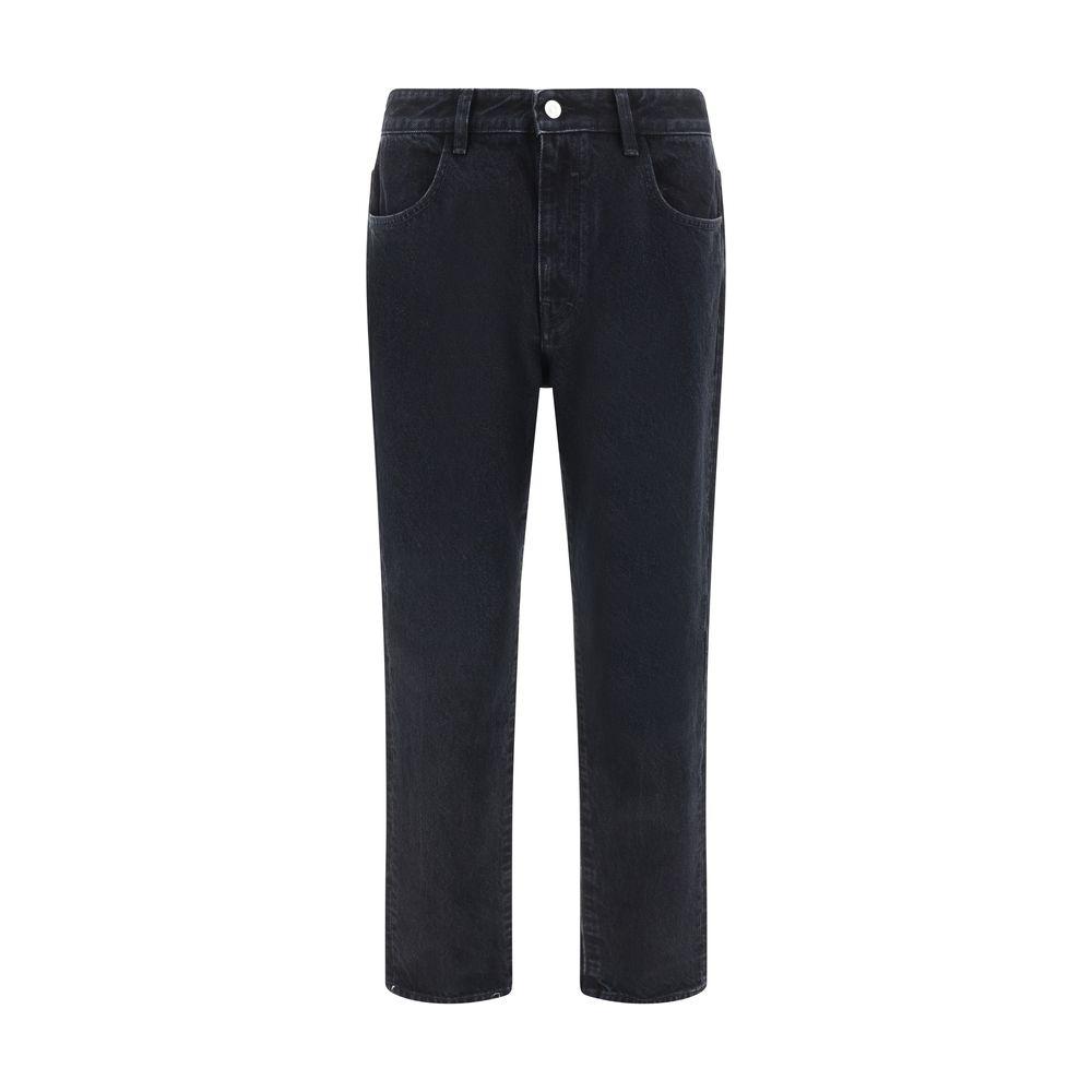 Givenchy cotton denim pants, black straight fit, five pockets, button and zipper closure, iconic leather patch on waistband.