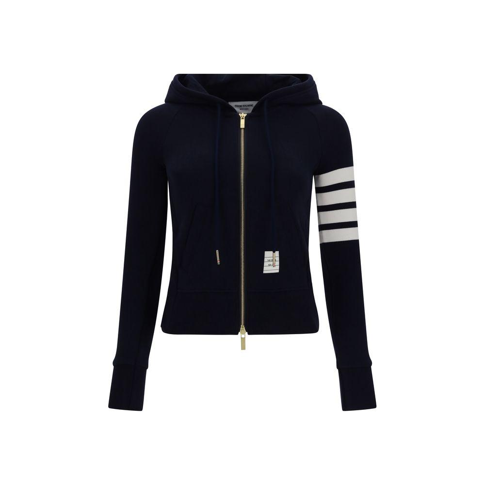 Thom Browne cotton hoodie with zip closure, ribbed cuffs, kangaroo pocket, and striped sleeve design, featuring logo patch on front.