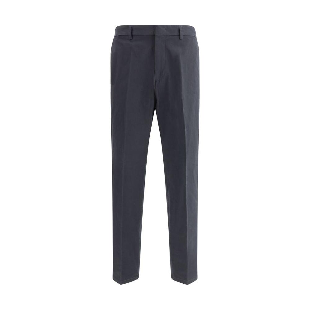 Jil Sander cropped pants with minimalist design, zipper closure, and welt pockets, featuring elasticized back for comfort.
