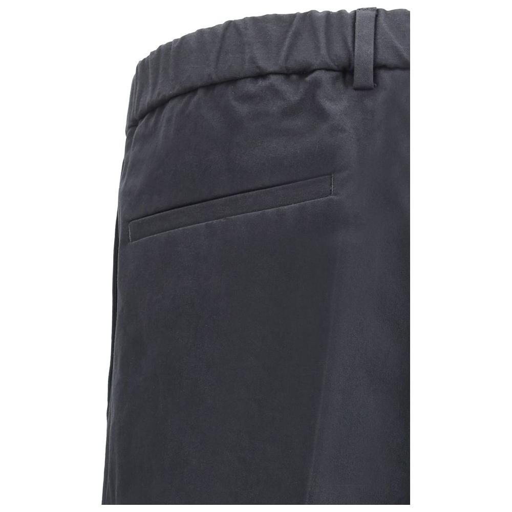 Jil Sander cotton cropped pants with elastic waistband and welt pocket showcasing minimalist design.