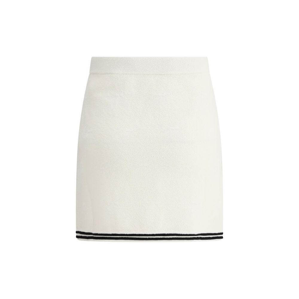 Self-Portrait midi skirt with elastic waistband, jacquard bow design, and contrasting hemline.