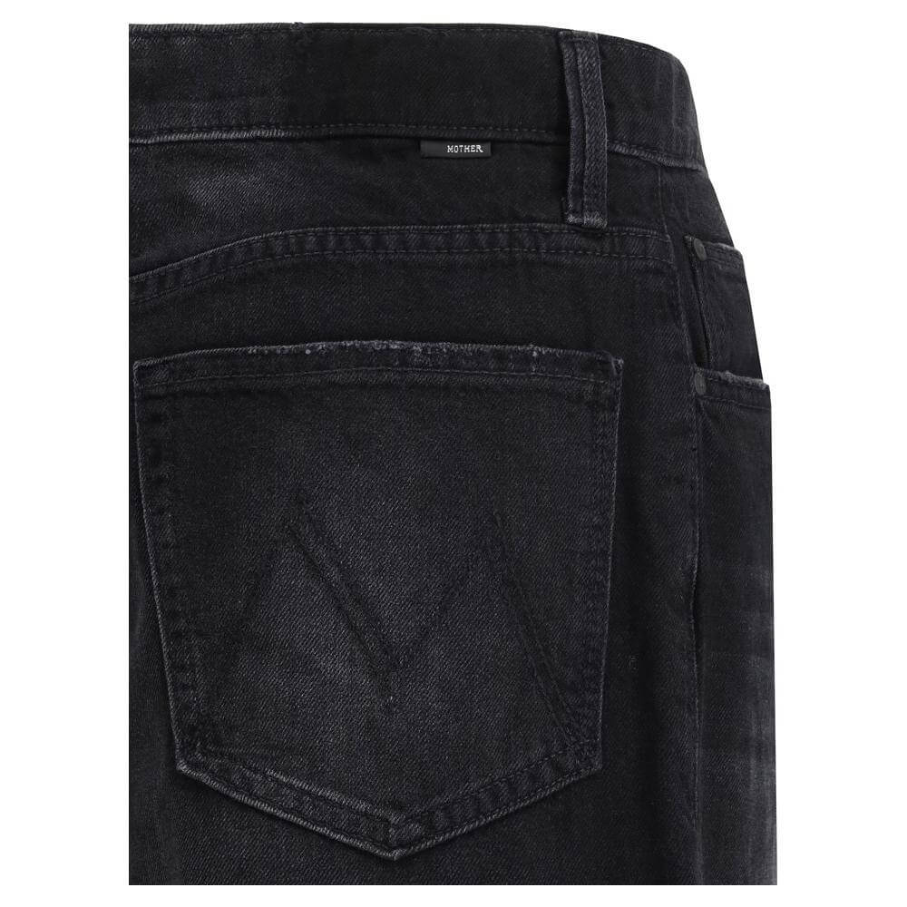 Close-up of black Mother Denim The Spinner Zip Sneak Jeans pocket with logo, showcasing stylish and versatile wide-leg design.