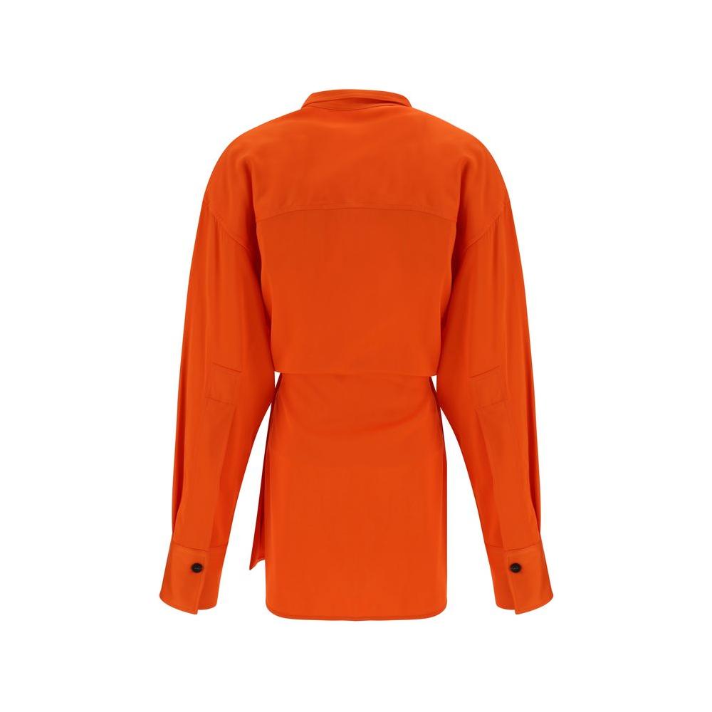 Back view of an orange Ferragamo shirt with classic collar, adjustable cuffs, kimono closure, and oversize fit.