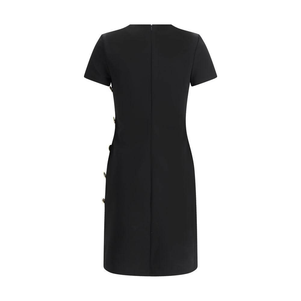 Back view of Givenchy short-sleeved dress with zipper closure and side button detail, showcasing sleek monochrome design and regular fit.